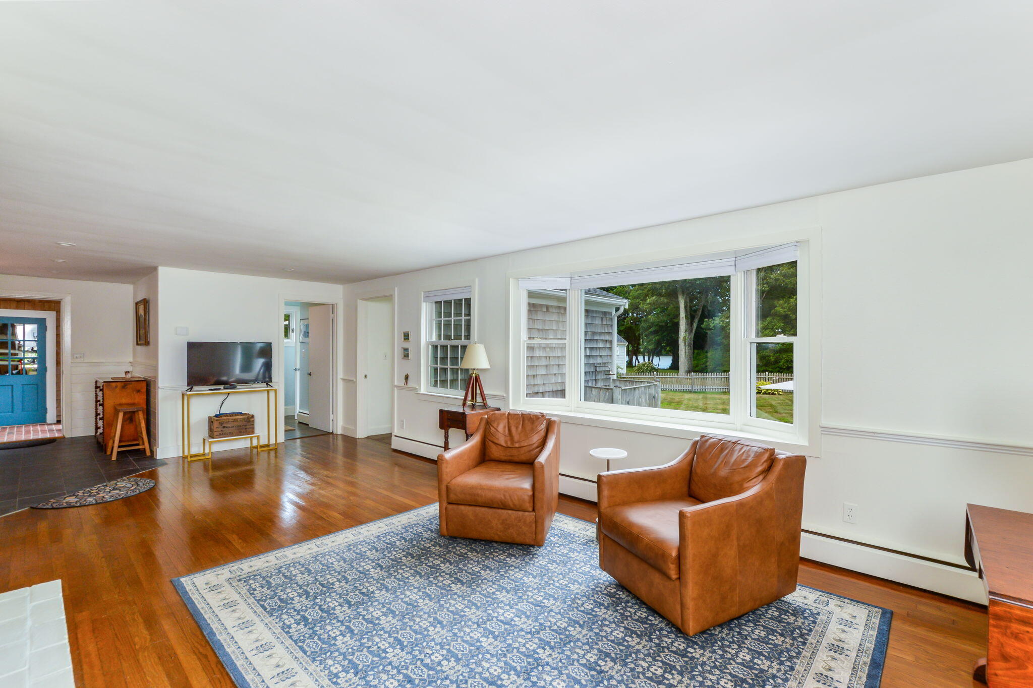 141 Pond View Drive Centerville, MA 02632 - Photo 21 of 44 a living room with furniture and a large window