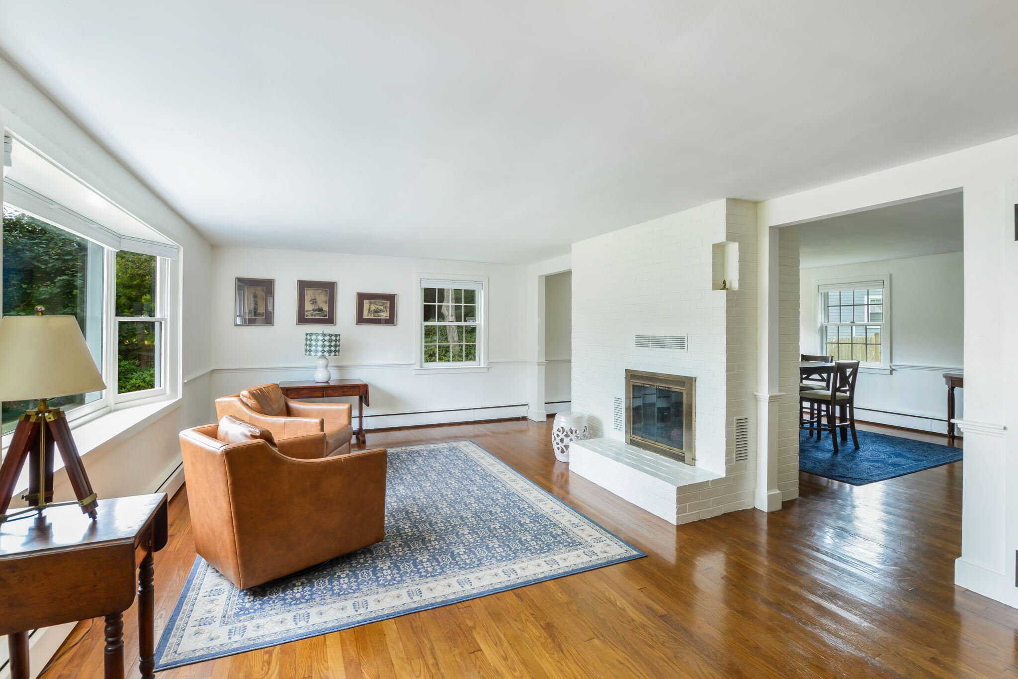 141 Pond View Drive Centerville, MA 02632 - Photo 22 of 44 a living room with furniture and a fireplace