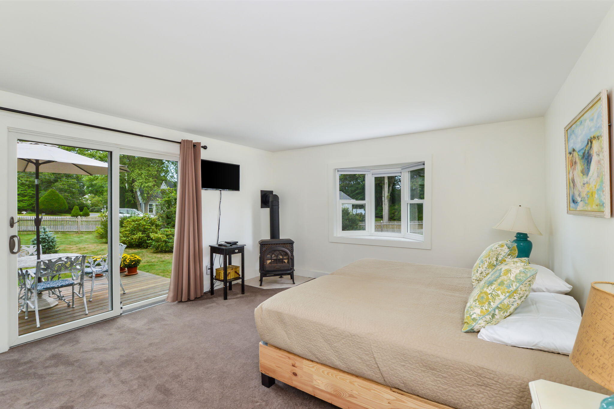 141 Pond View Drive Centerville, MA 02632 - Photo 25 of 44 a living room with furniture and large windows