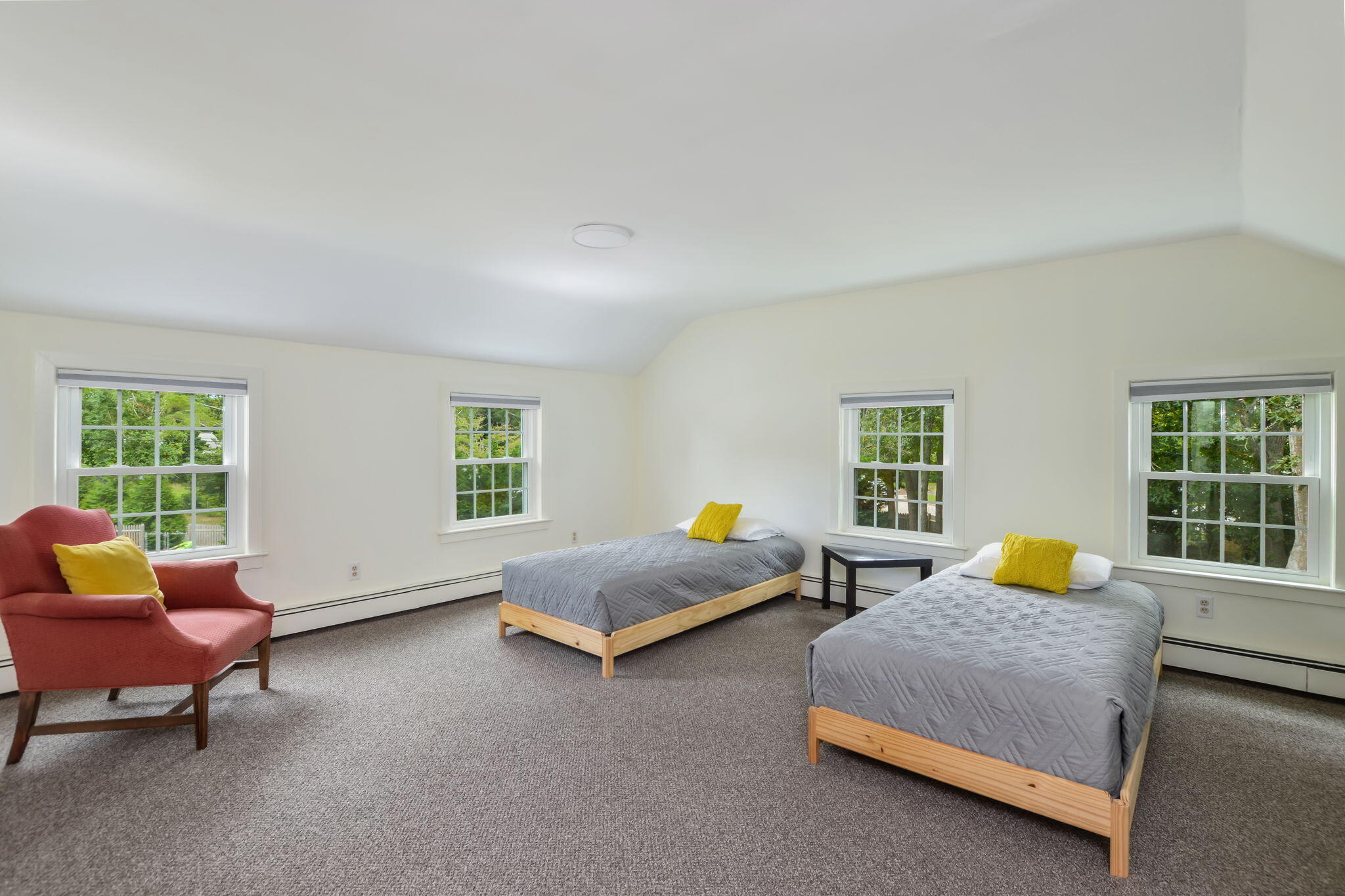 141 Pond View Drive Centerville, MA 02632 - Photo 27 of 44 a bedroom with three beds and window