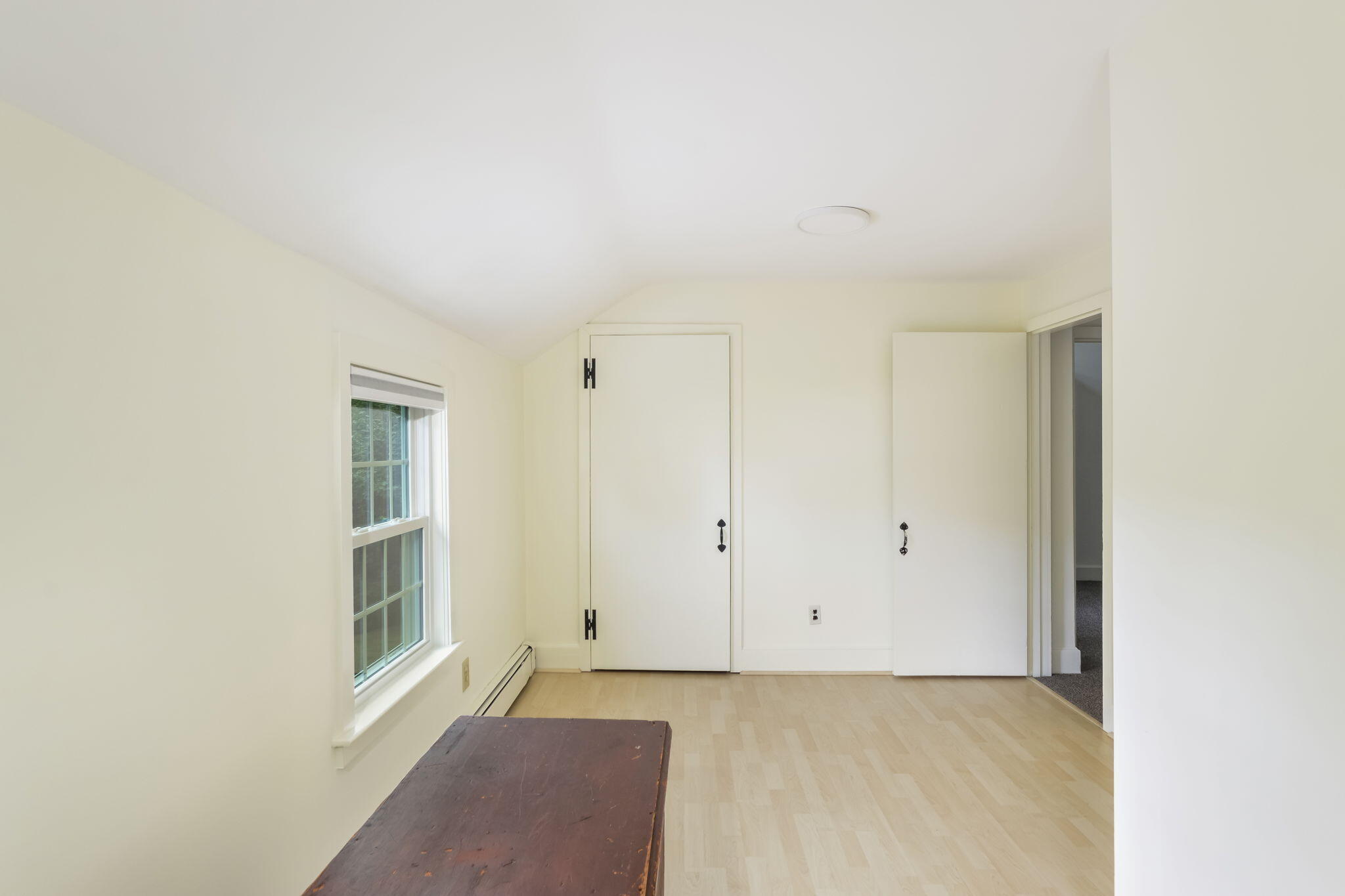 141 Pond View Drive Centerville, MA 02632 - Photo 29 of 44 a view of an empty room with a window