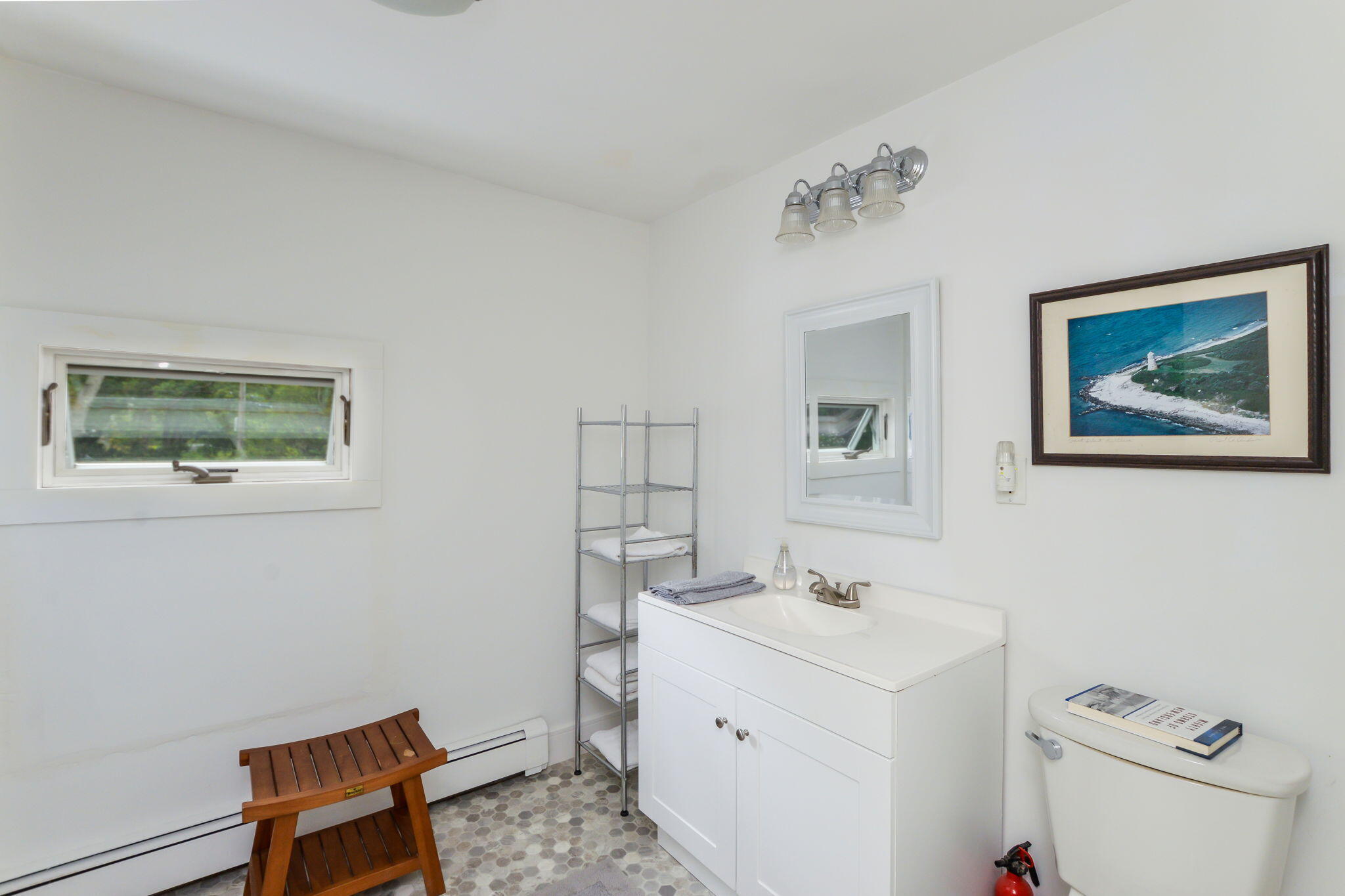 141 Pond View Drive Centerville, MA 02632 - Photo 30 of 44 a bathroom with a sink mirror and toilet