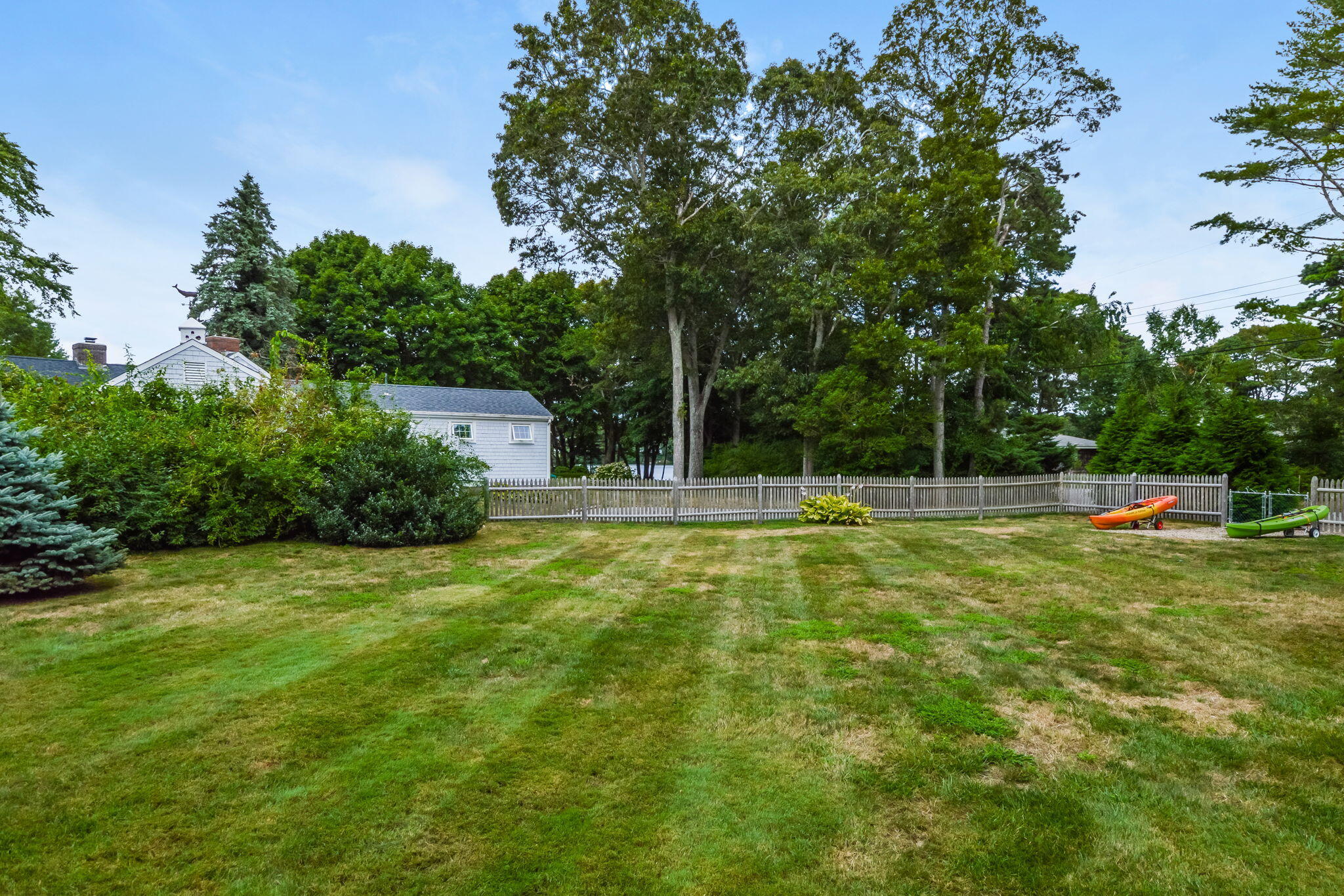 141 Pond View Drive Centerville, MA 02632 - Photo 7 of 44 a view of a house with a backyard