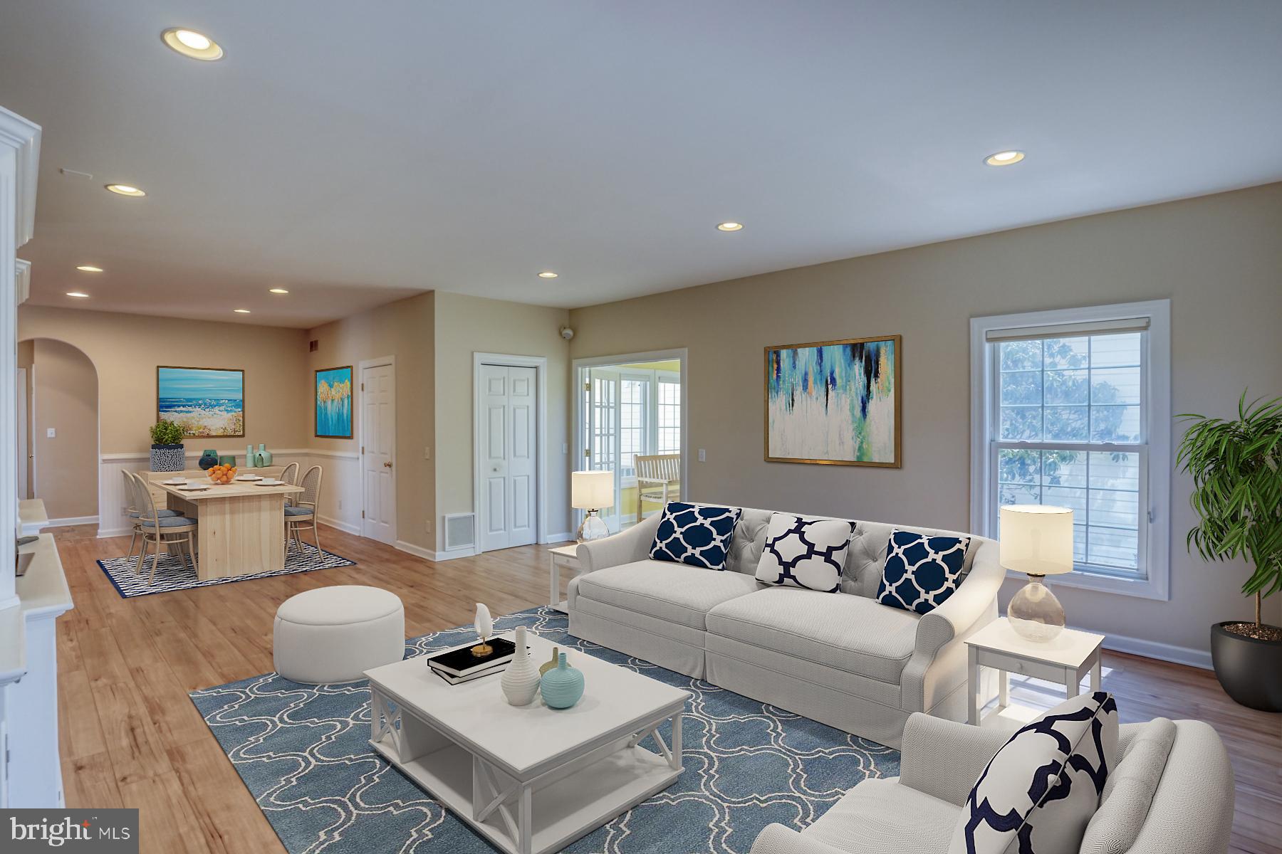 18605 Road 255 Georgetown, DE 19947 - Photo 18 of 93 a living room with furniture and a table
