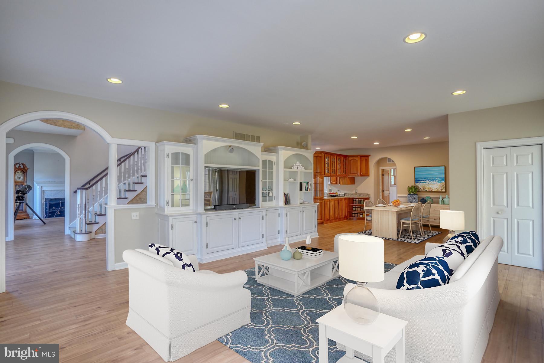 18605 Road 255 Georgetown, DE 19947 - Photo 22 of 93 a living room with furniture kitchen view and a flat screen tv