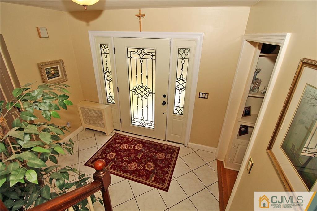 40 Stafford Road Colonia, NJ 07067 - Photo 11 of 25 a view of a entryway with furniture and front door