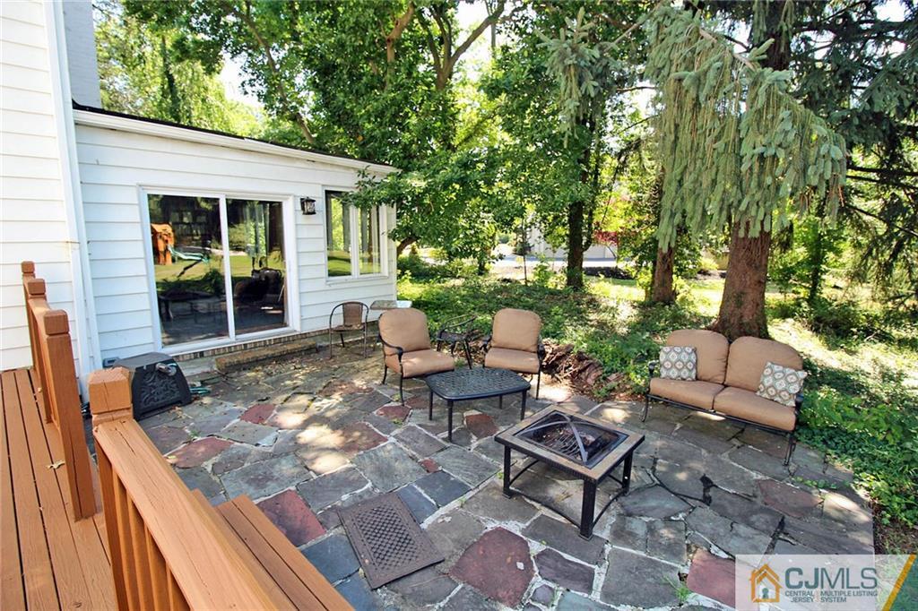 40 Stafford Road Colonia, NJ 07067 - Photo 5 of 25 a view of a backyard with sitting area