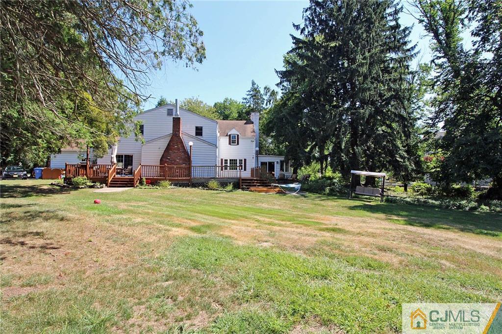 40 Stafford Road Colonia, NJ 07067 - Photo 6 of 25 a view of a house with a yard
