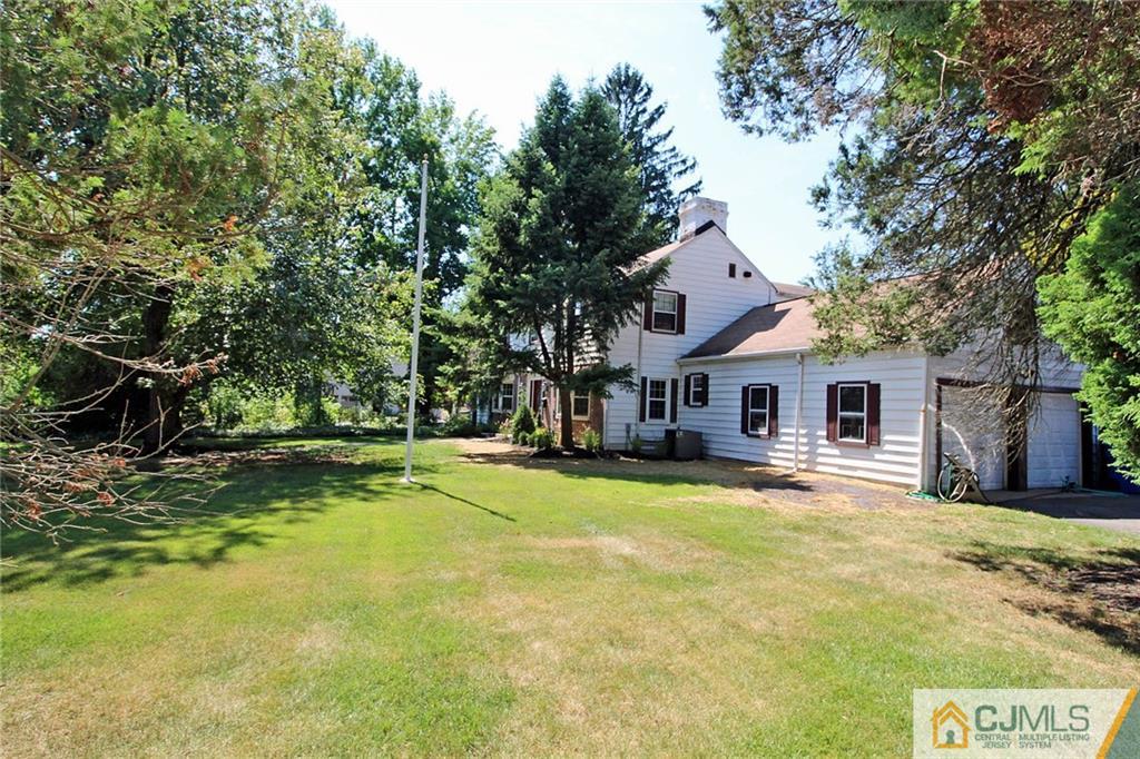 40 Stafford Road Colonia, NJ 07067 - Photo 8 of 25 a front view of house with yard and trees