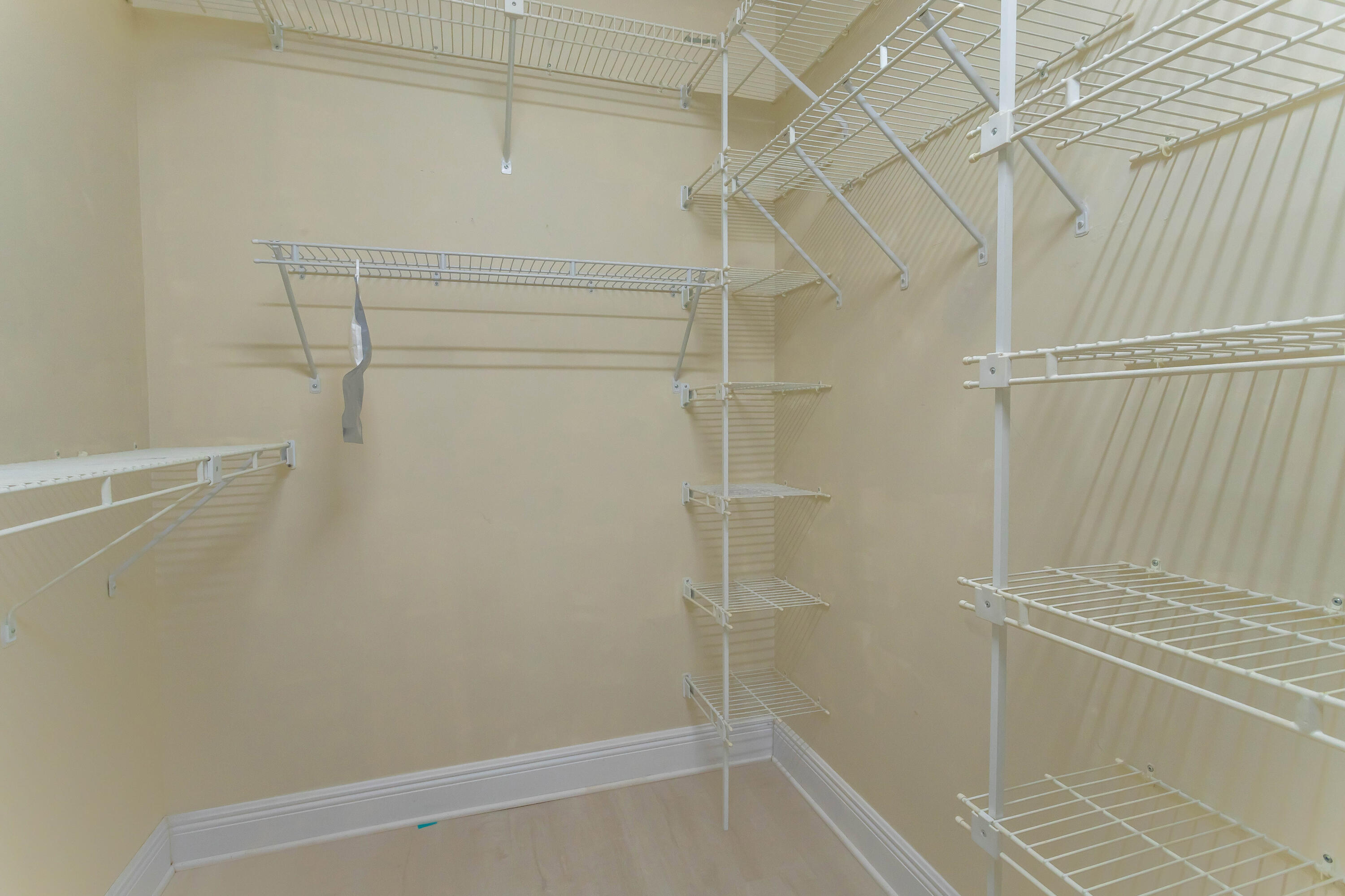 8910 Meadowlark Way, Unit 114 Boca Raton, FL 33496 - Photo 11 of 21 Primary Bedroom Closet