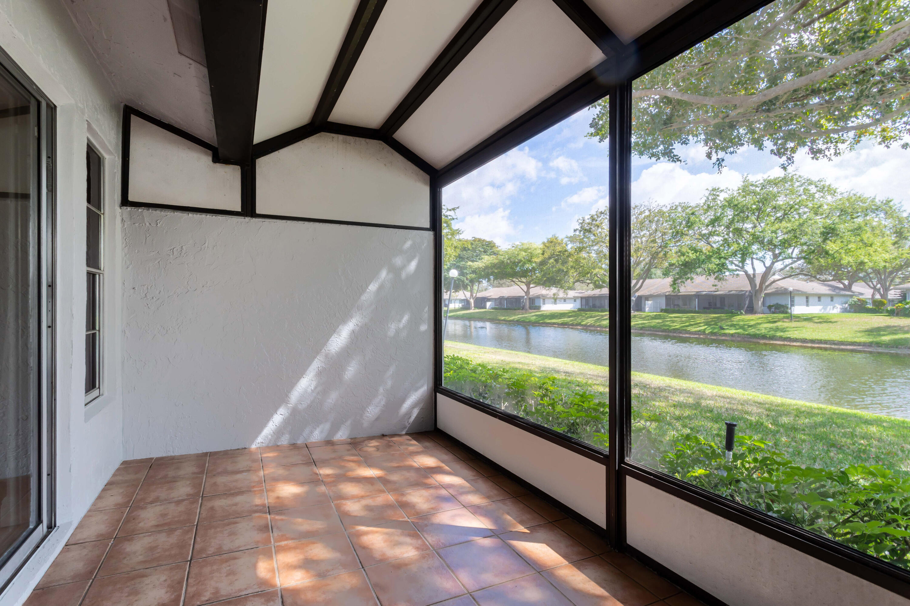 8910 Meadowlark Way, Unit 114 Boca Raton, FL 33496 - Photo 15 of 21 Rear Covered Terrace