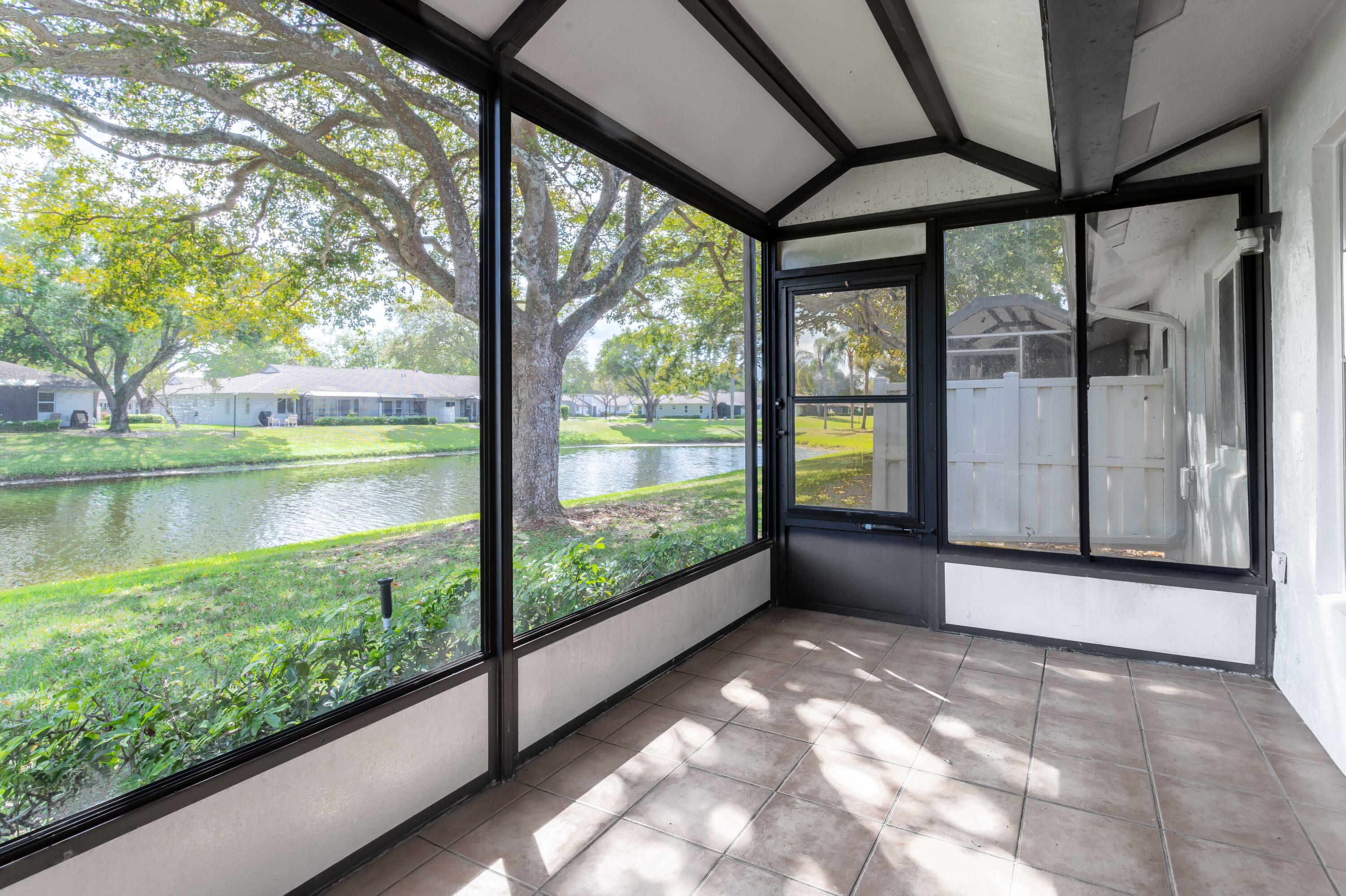 8910 Meadowlark Way, Unit 114 Boca Raton, FL 33496 - Photo 16 of 21 Rear Covered Terrace