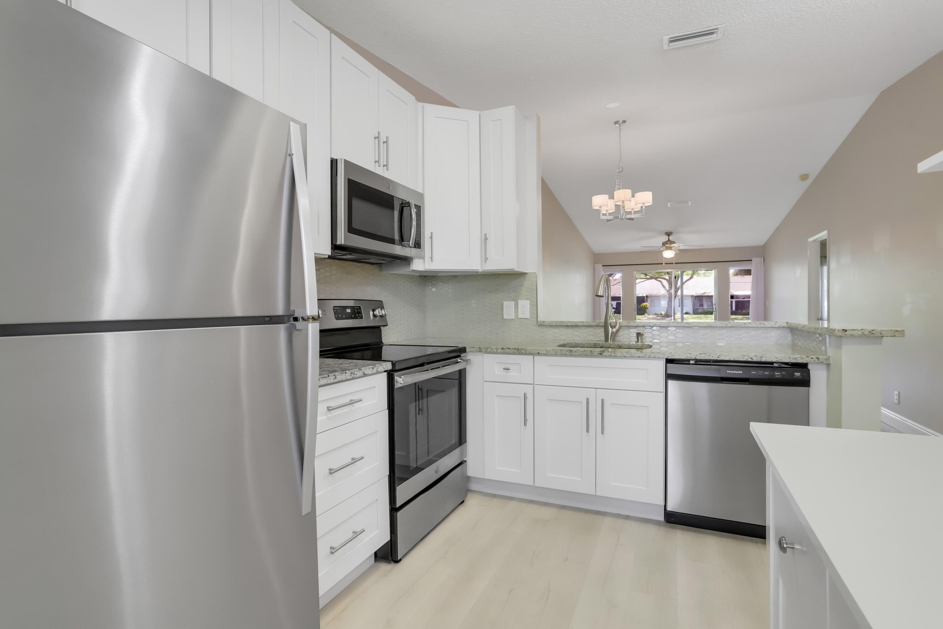 8910 Meadowlark Way, Unit 114 Boca Raton, FL 33496 - Photo 3 of 21 Kitchen