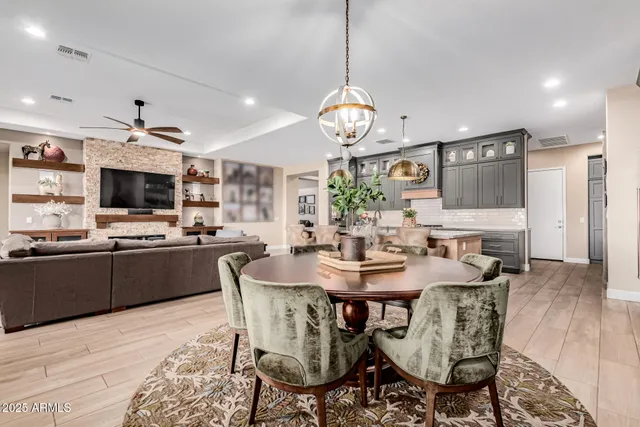 a view of a hallway with wooden floor and entryway