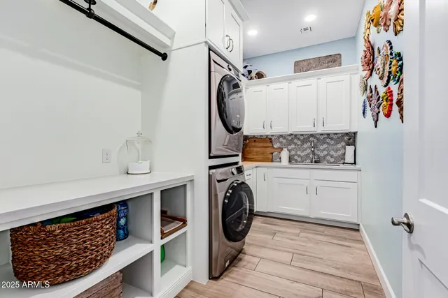a bedroom with a bed couch and window