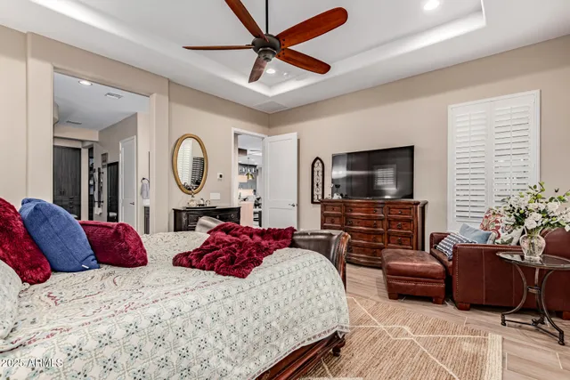 a spacious bathroom with a double vanity sink a mirror and shower