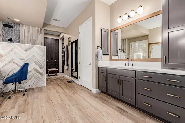 a view of a bathroom with a shower and a window