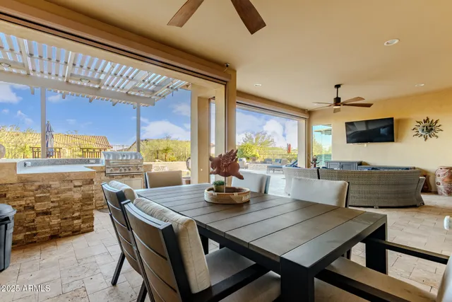 an aerial view of a city with ocean