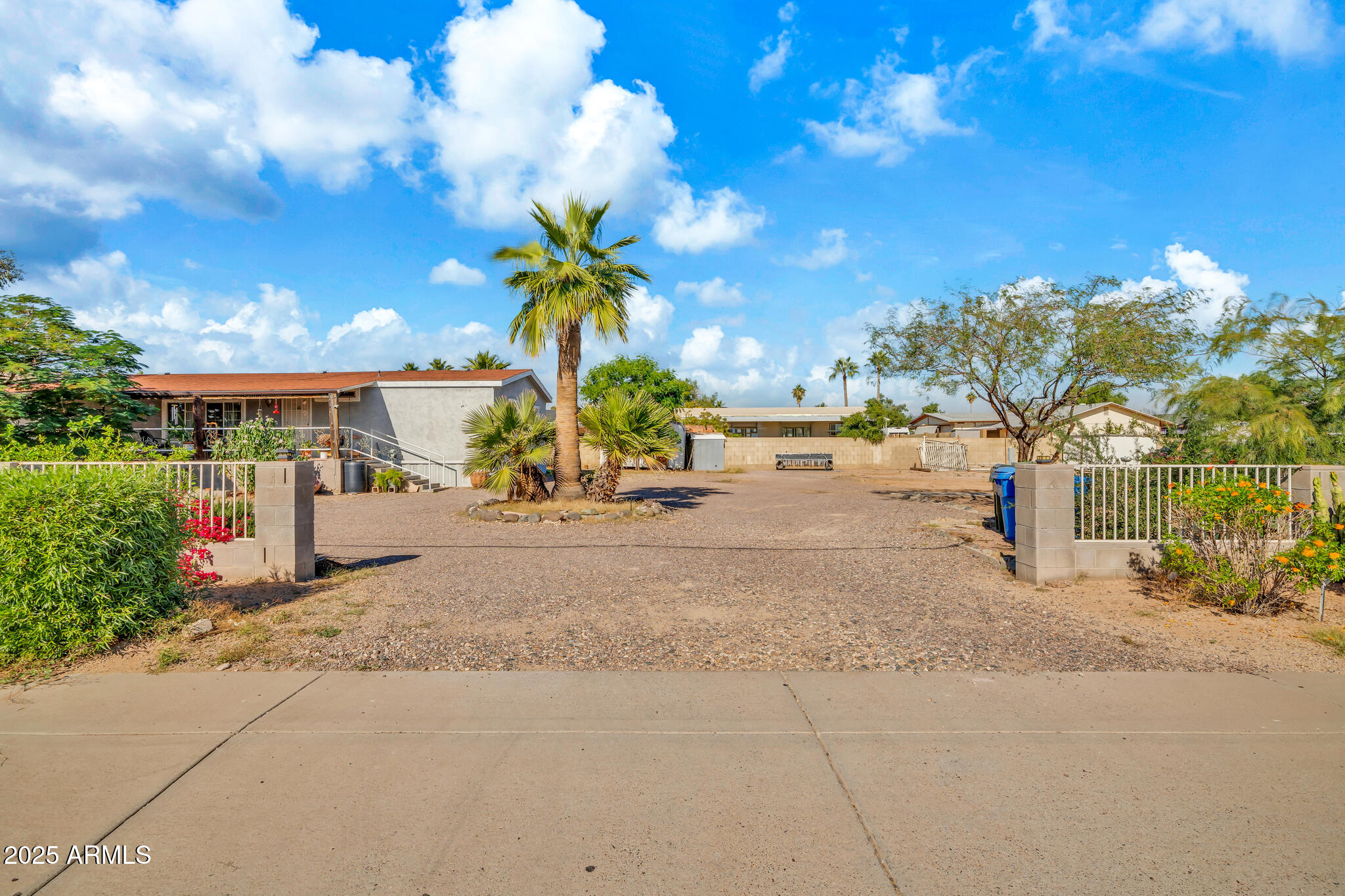 2510 East Utopia Road Phoenix, AZ 85050 - Photo 1 of 31 a view of a park with swings and slides