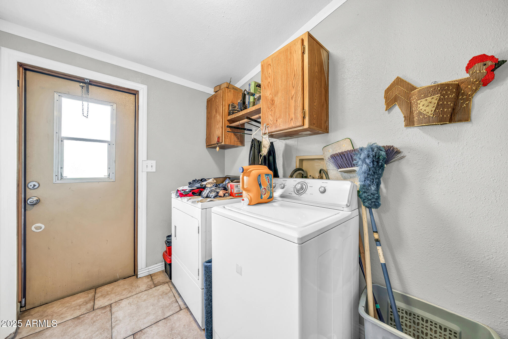 2510 East Utopia Road Phoenix, AZ 85050 - Photo 23 of 31 a utility room with sink dryer and washer