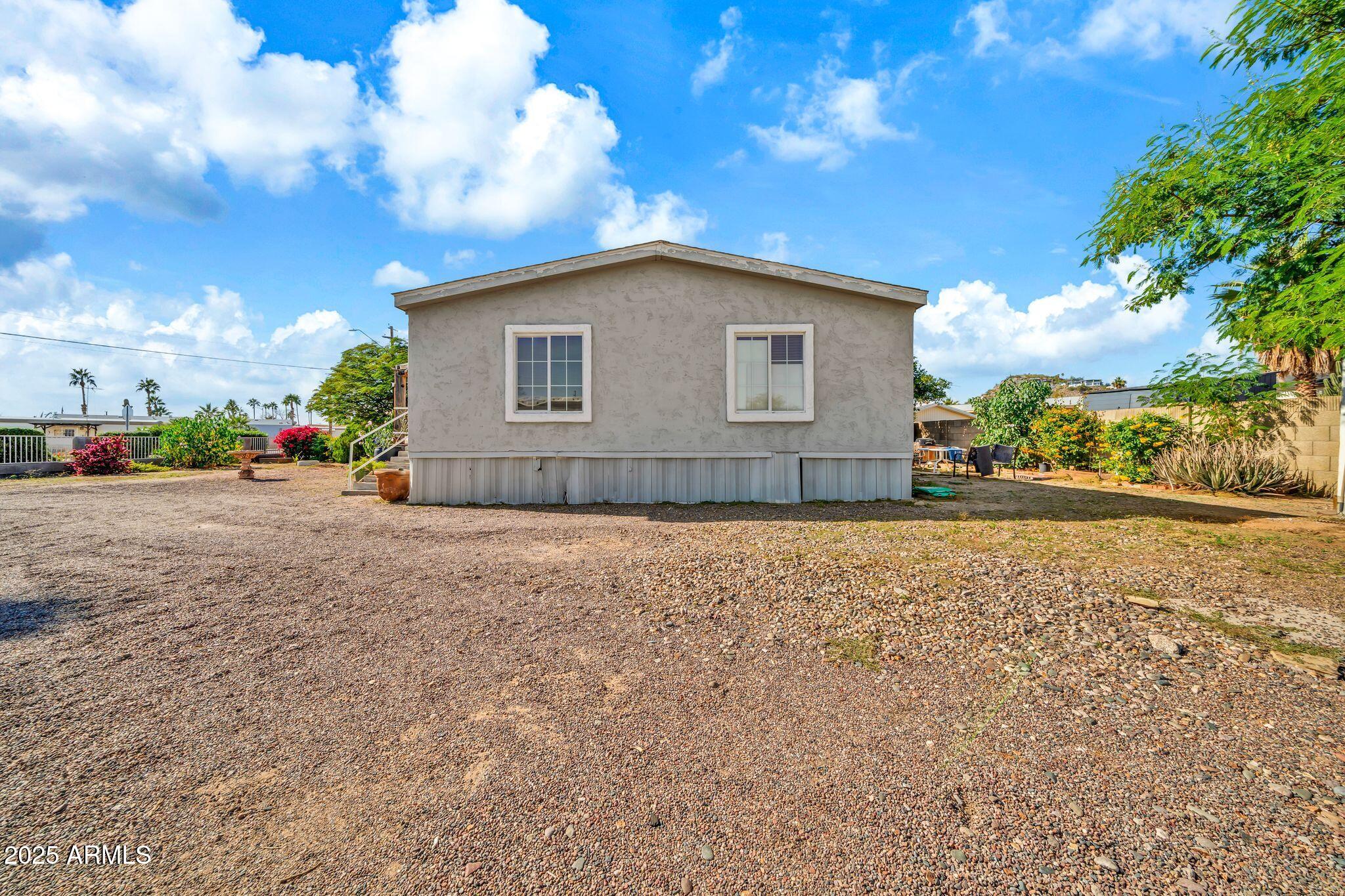 2510 East Utopia Road Phoenix, AZ 85050 - Photo 26 of 31 a house view with a garden space
