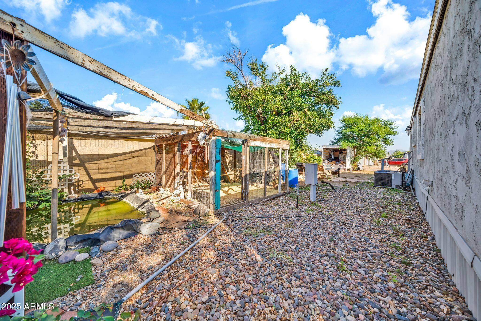2510 East Utopia Road Phoenix, AZ 85050 - Photo 27 of 31 a view of a porch with a bench in patio