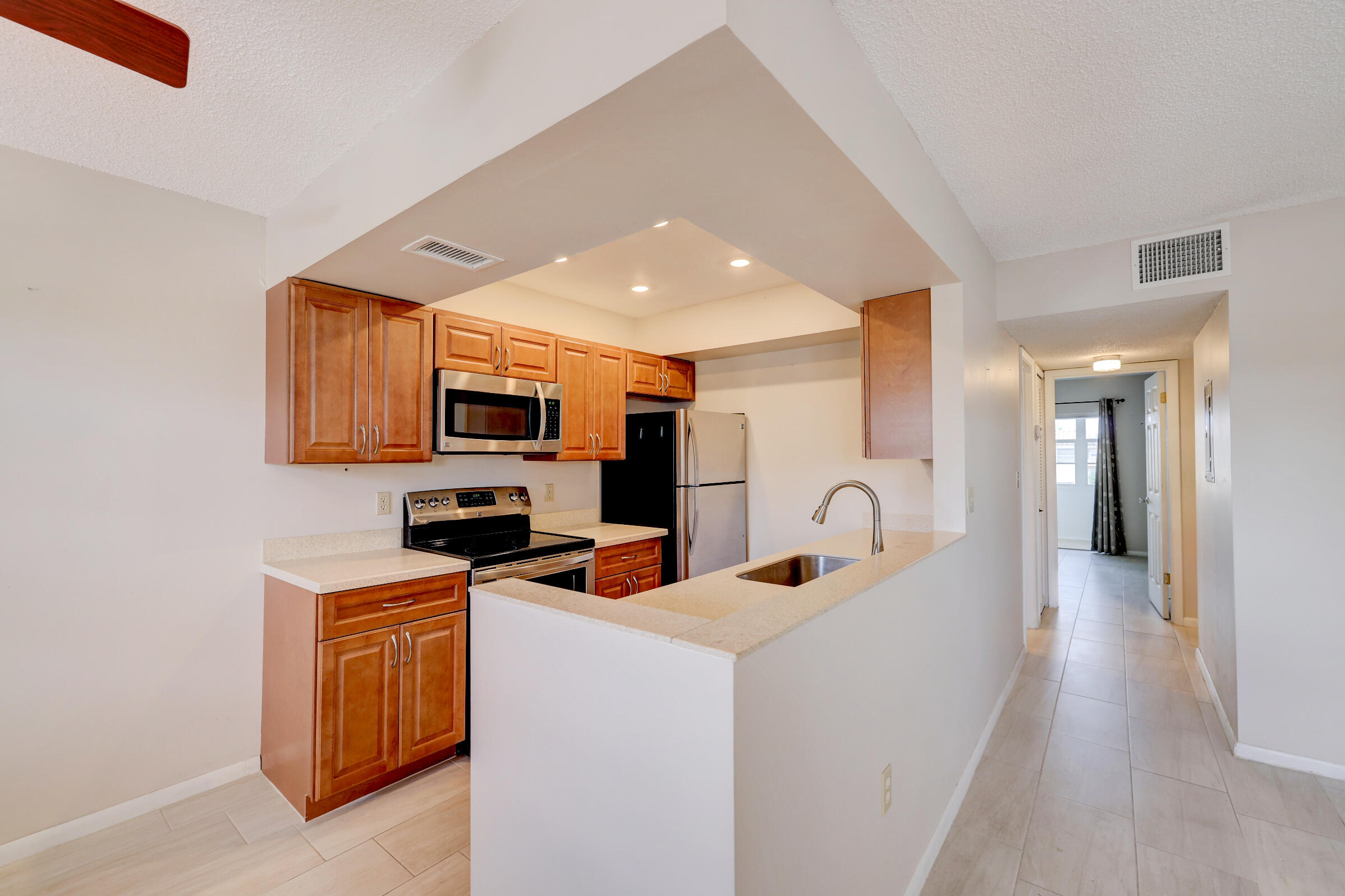 2600 South Kanner Highway, Unit R8 Stuart, FL 34994 - Photo 9 of 35 Updated kitchen
