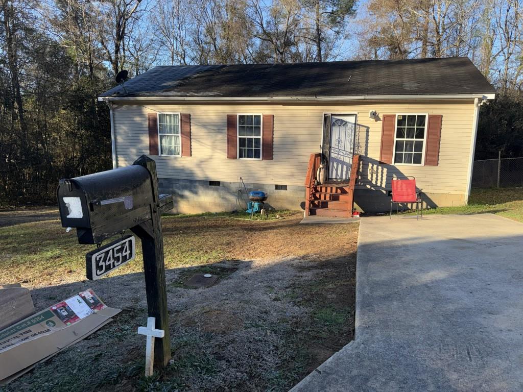 3454 Lawton Road Macon, GA 31204 - Photo 1 of 13 a view of backyard of the house