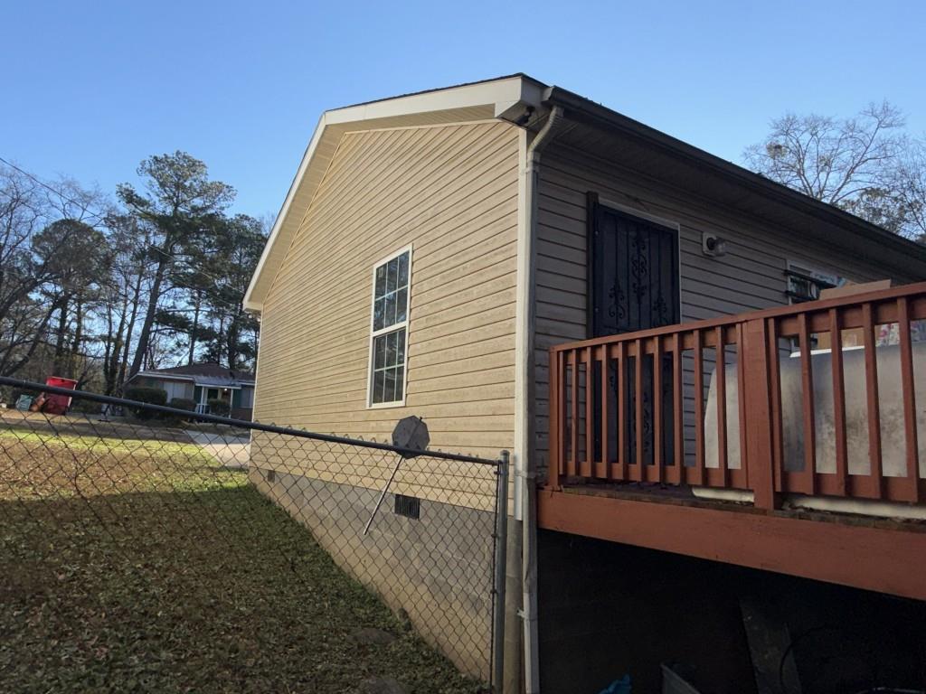 3454 Lawton Road Macon, GA 31204 - Photo 12 of 13 a backyard of a house with wooden floor