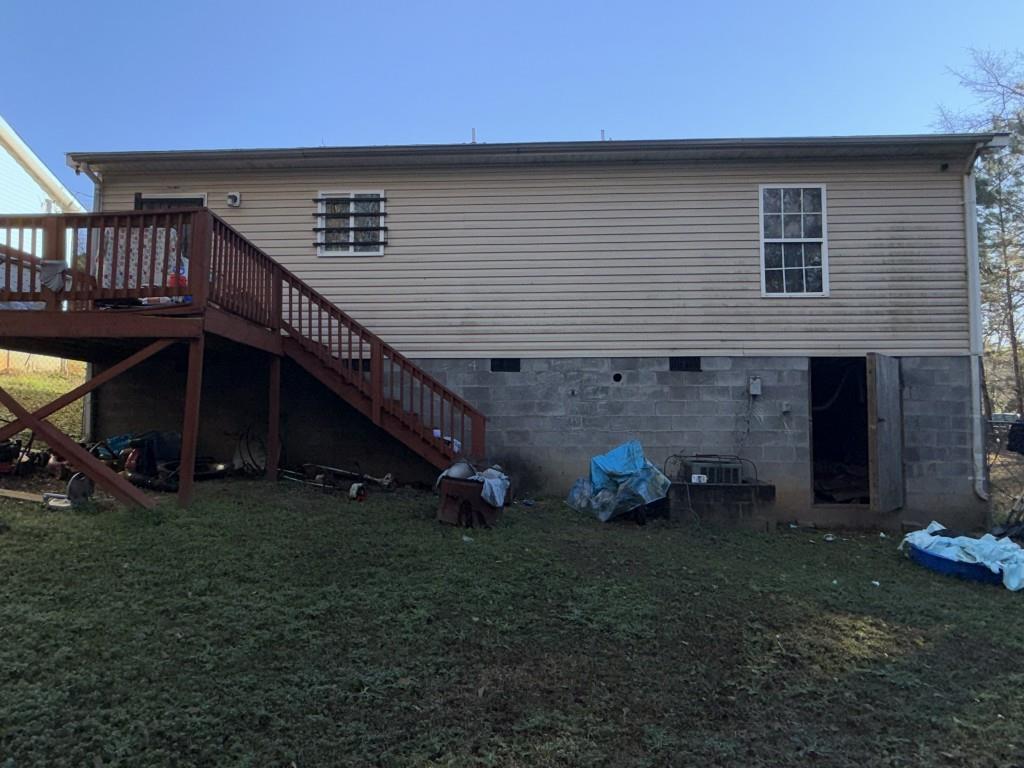 3454 Lawton Road Macon, GA 31204 - Photo 13 of 13 a backyard of a house with table and chairs