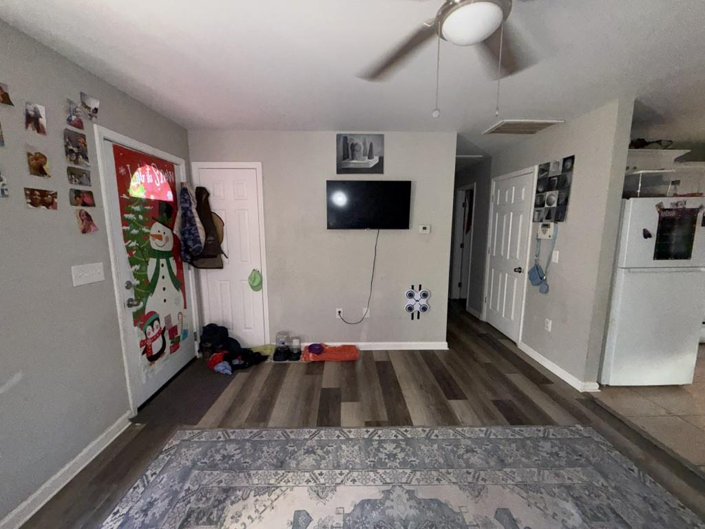 3454 Lawton Road Macon, GA 31204 - Photo 3 of 13 a living room with furniture and a flat screen tv