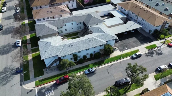 an aerial view of a house with a garden