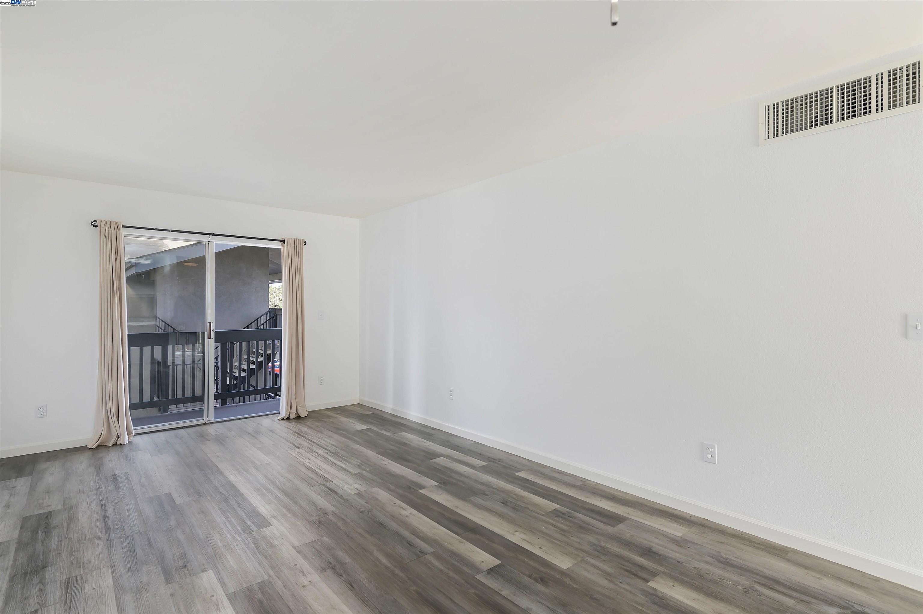3849 Vineyard Avenue, Unit B Pleasanton, CA 94566 - Photo 5 of 21 a view of a livingroom with wooden floor