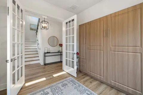 a room with a bed and a window