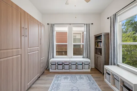 a view of entryway with wooden floor