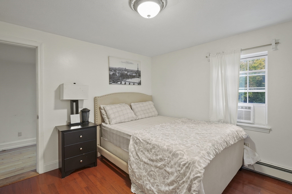 108 Royalston Road North Winchendon, MA 01475 - Photo 23 of 32 a bedroom with a bed and a window