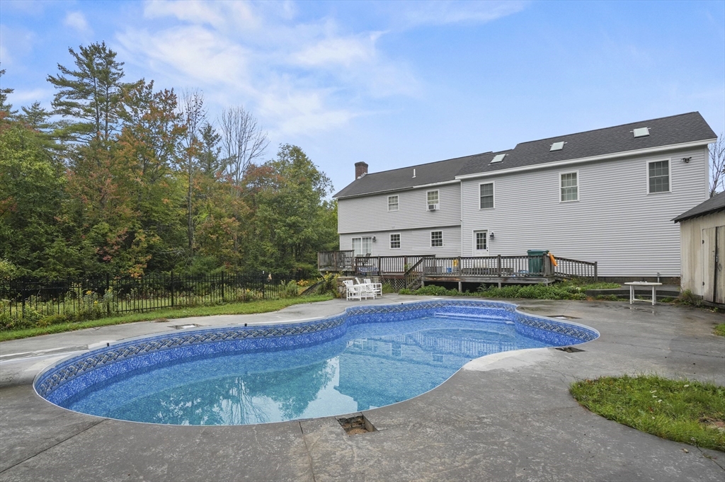 108 Royalston Road North Winchendon, MA 01475 - Photo 31 of 32 a view of a house with swimming pool and yard