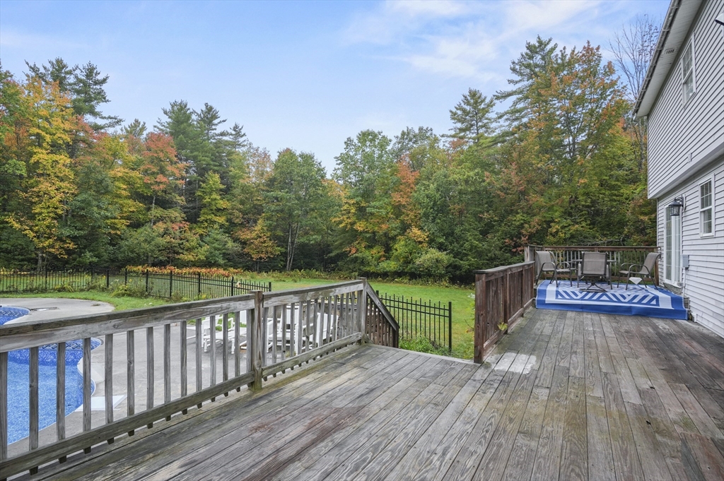 108 Royalston Road North Winchendon, MA 01475 - Photo 32 of 32 a view of a deck with wooden floor and fence