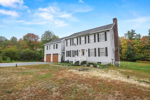 a house view with a garden space
