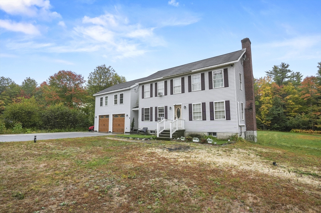 108 Royalston Road North Winchendon, MA 01475 - Photo 4 of 32 a house view with a garden space
