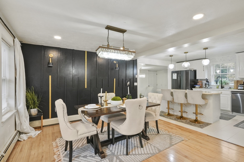 108 Royalston Road North Winchendon, MA 01475 - Photo 8 of 32 a dining room with furniture and wooden floor