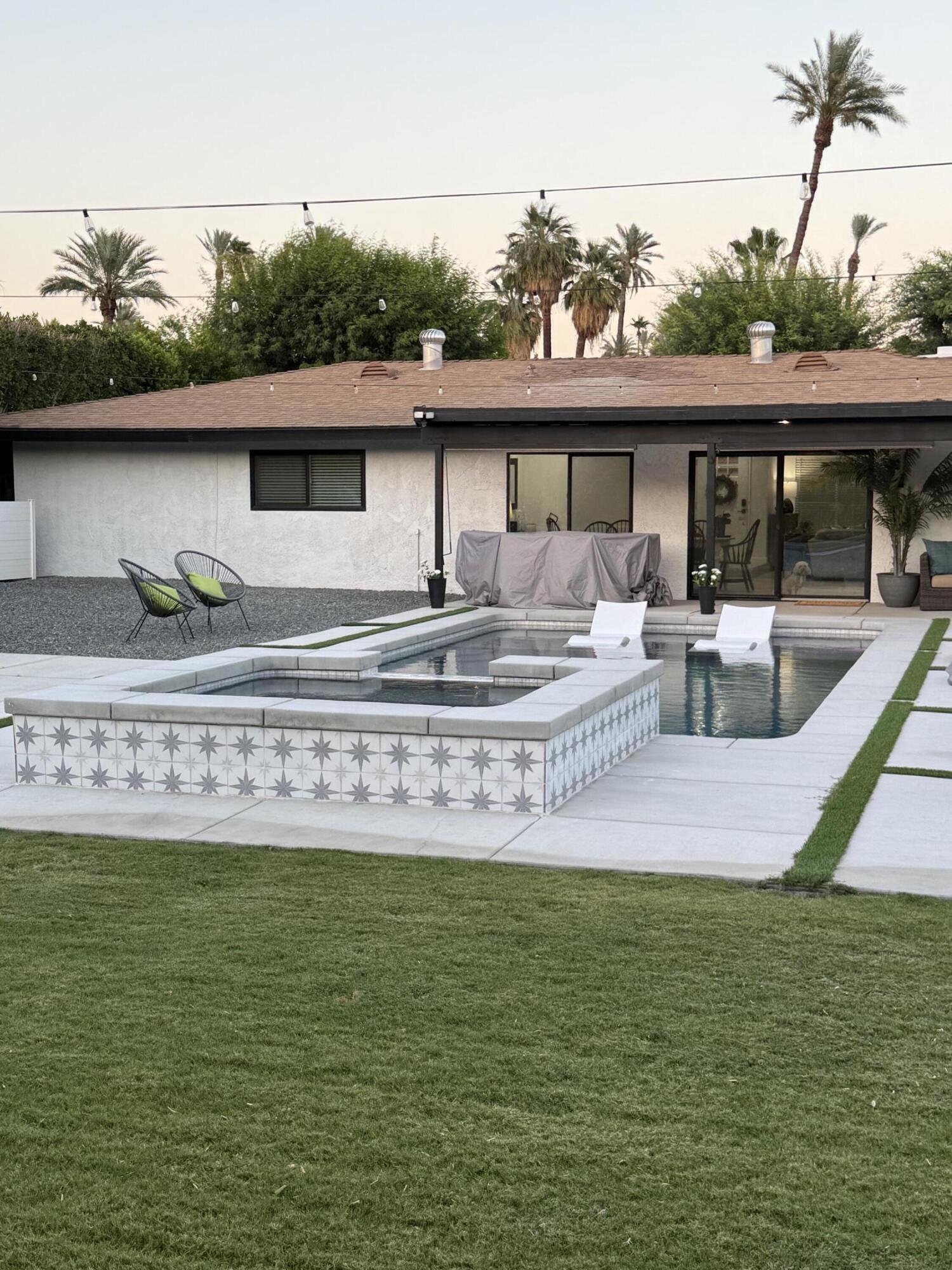 37081 Palmdale Road Rancho Mirage, CA 92270 - Photo 43 of 46 a front view of house with yard and entertaining space
