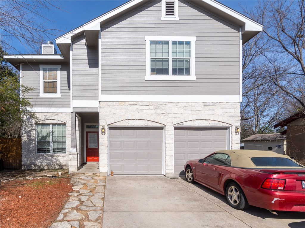 500 West N Loop Boulevard Austin, TX 78751 - Photo 1 of 1 a car parked in front of a house