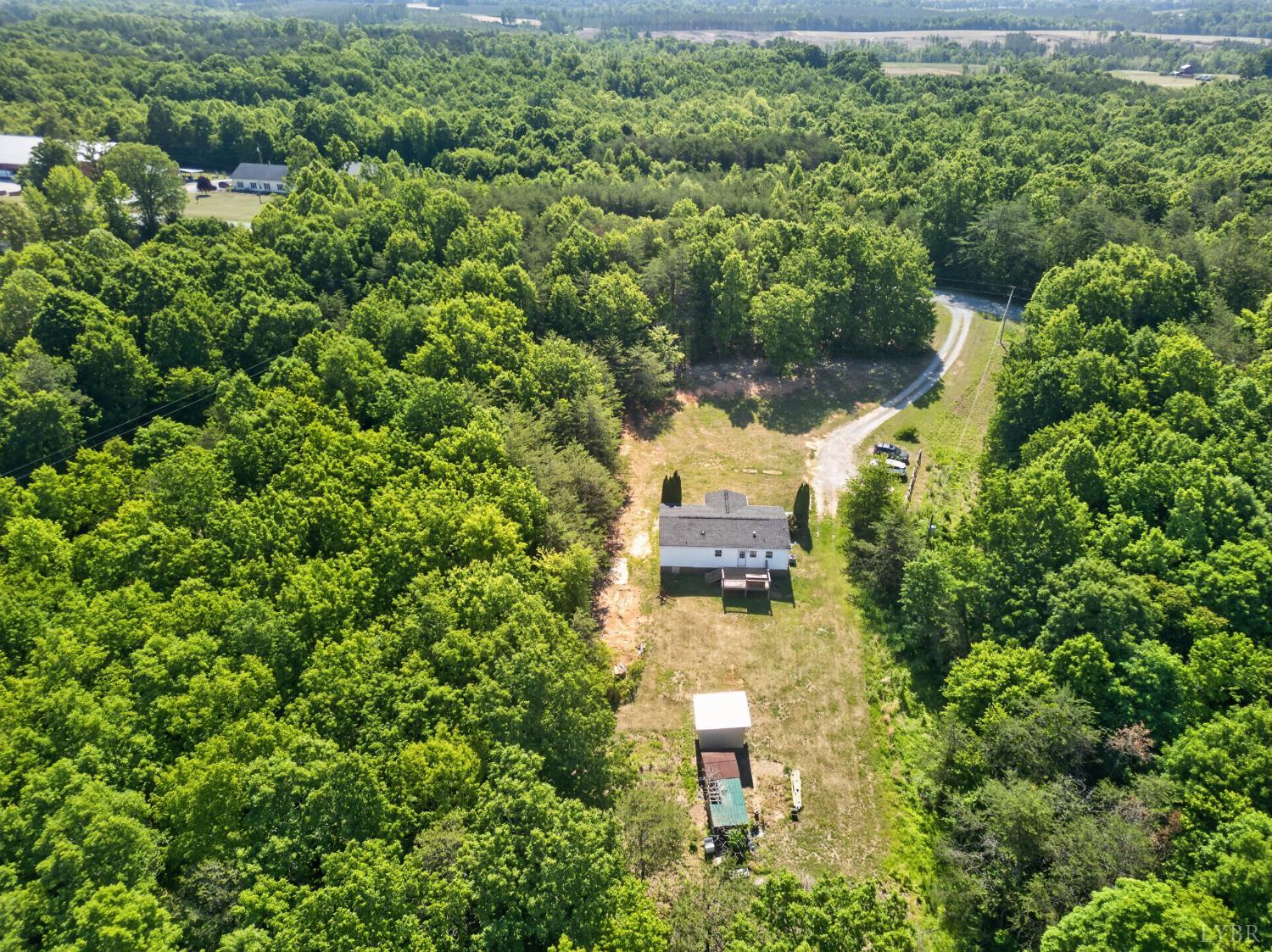 1811 Mohawk Road Gladys, VA 24554 - Photo 50 of 51 an aerial view of a house with a yard