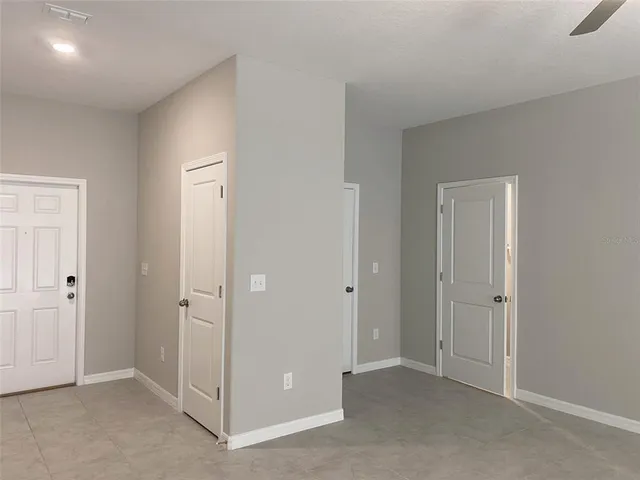a bathroom with a sink toilet and mirror