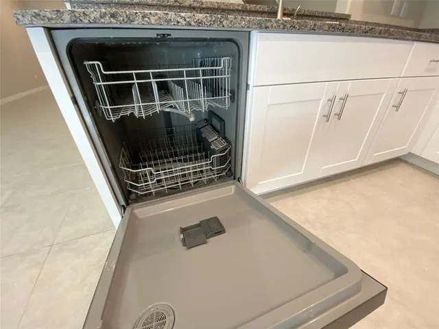 a bathroom with a mirror and a shower