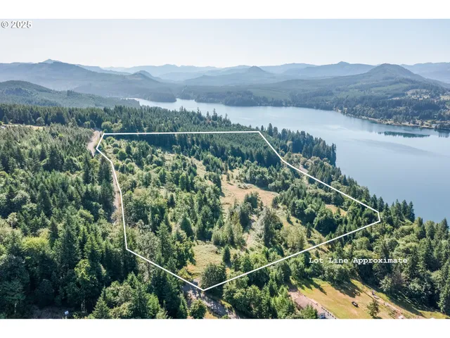 a view of a city with mountains in the background