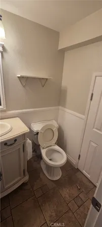 a bathroom with a sink and a toilet