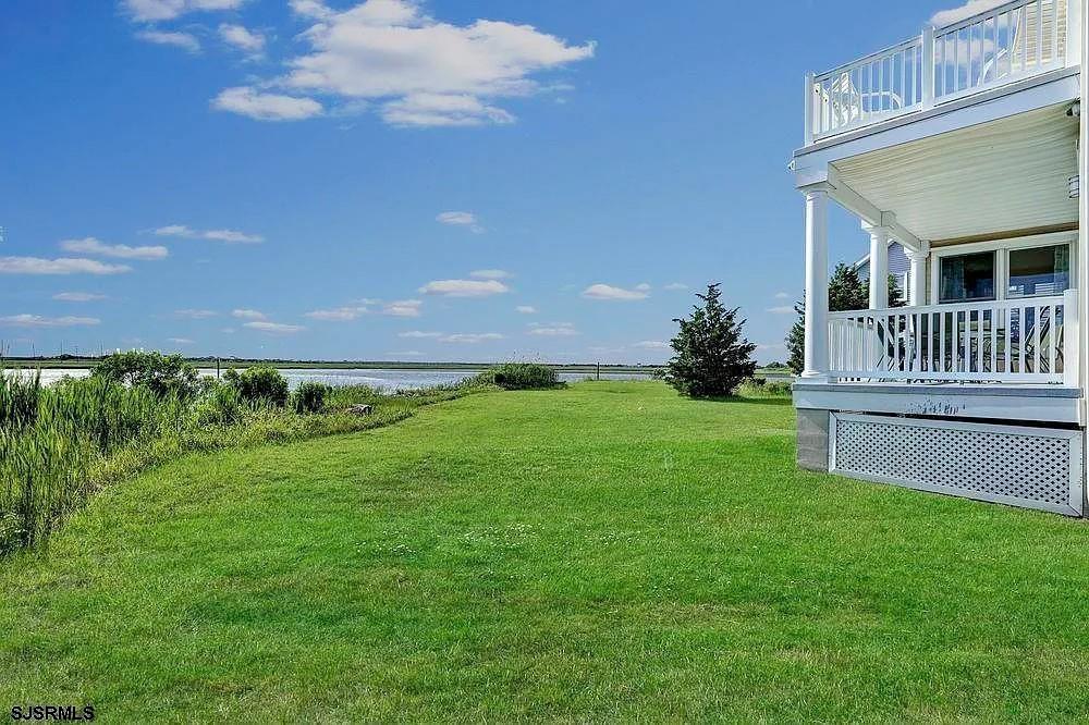 2140 West Riverside Drive Atlantic City, NJ 08401 - Photo 5 of 30 a view of an house with backyard