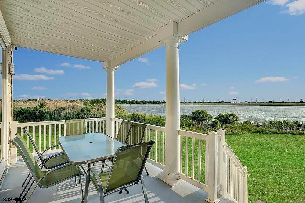 2140 West Riverside Drive Atlantic City, NJ 08401 - Photo 7 of 30 a view of a chair and table in the garden